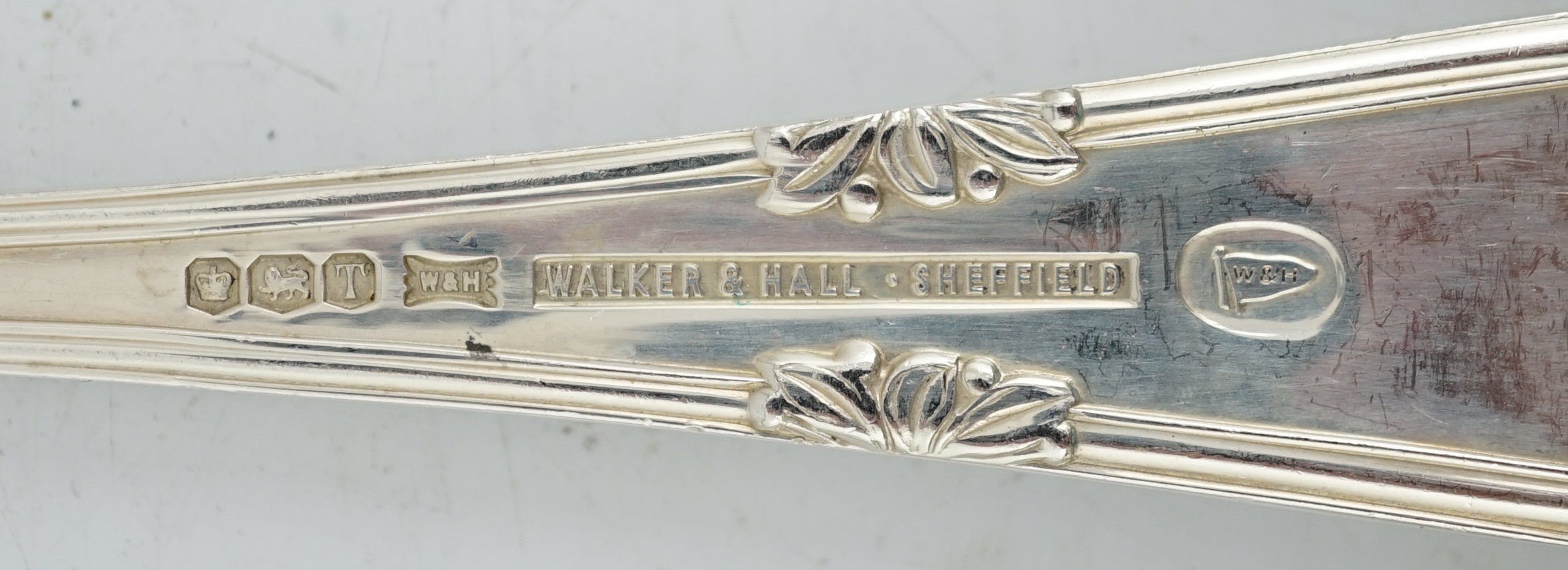 An Elizabeth II canteen of silver cutlery for six, by Walker & Hall